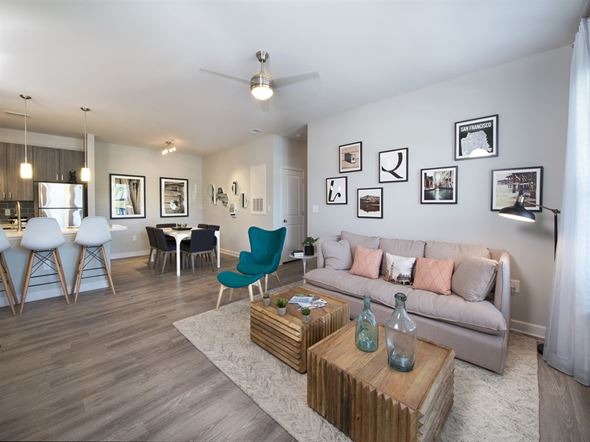 Concord apartment for rent - Spacious living room with hardwood-inspired flooring