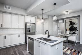 Wake Forest apartment for rent - Fully-equipped kitchen and dining area in model