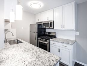 Mayfield Heights apartment for rent - Stainless steel appliances in open concept kitchens