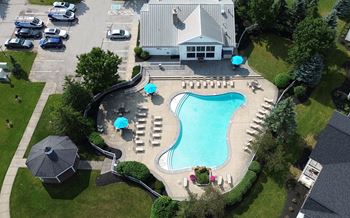Heated outdoor pool with cascading waterfall