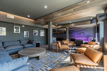 Host events in our private whiskey lounge available to rent, featuring a tv and built-in stage