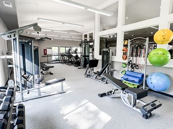 24-Hour fitness studio with pilates/yoga zone