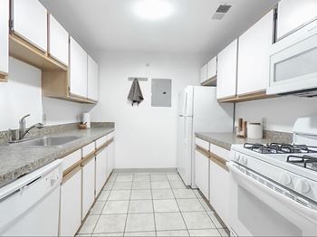 Fully-equipped kitchens with built-in microwaves, refrigerators and gas ranges