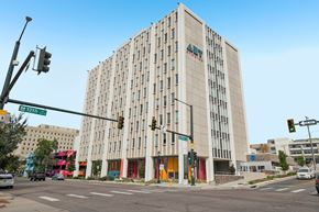 Denver apartment for rent - A tall building with the letters AT&T on the side of it.