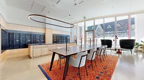 Denver apartment for rent - A conference room with a long table and chairs.