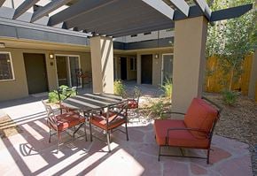 Denver apartment for rent - A patio with a table and chairs.