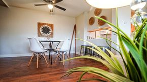 Arvada apartment for rent - A dining room with a white table and chairs.