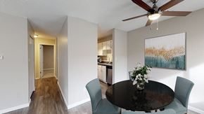 Lakewood apartment for rent - A dining room with a table set for two.