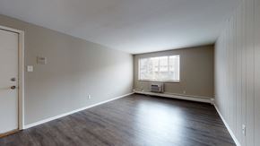 Littleton apartment for rent - A room with a door and a window.