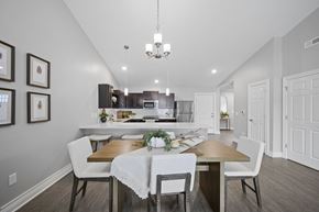 Strongsville apartment for rent - A dining room with a table set for four.