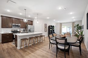 Brimfield apartment for rent - A modern kitchen with a dining table and chairs.