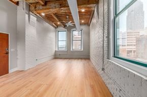 Cleveland apartment for rent - Room with white brick walls at Shorehaus Lofts Apartments, Cleveland
