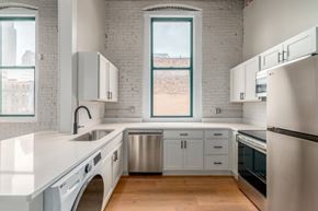 Cleveland apartment for rent - Kitchen with white cabinets at Shorehaus Lofts Apartments, Cleveland, 44113