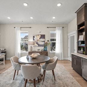 Hinckley apartment for rent - A modern dining room with a round table and chairs.