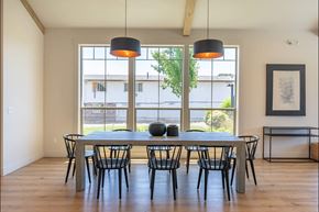 St Helens apartment for rent - A dining room with a table and chairs at St Helens Place Apartment Homes, St Helens