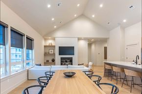 Pendleton apartment for rent - A modern dining room with a wooden table and chairs at Westgate Apartment Homes, Pendleton, OR