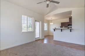 Independence apartment for rent - A spacious room with a ceiling fan and a window at Riverplace Apartment Homes, Oregon, 97351