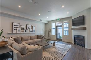 Sandy apartment for rent - A living room with a fireplace and a couch at Sandyplace Apartment Homes, Sandy