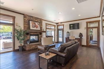 Living room with stone fireplace