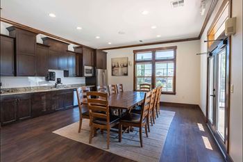 Kitchen with dark wood cabinets