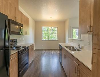 Kitchen with wooden cabinets