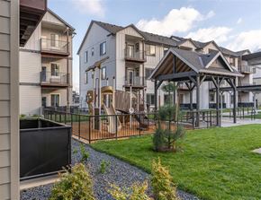 Woodburn apartment for rent - A residential area with houses and a playground.