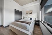 Windsor apartment for rent - A bedroom with a large bed and a window at Damask, Ontario