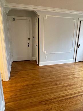 St. Paul apartment for rent - A room with wood flooring and white walls.
