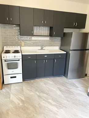 Saint Paul apartment for rent - Updated kitchen with new flooring and tiled backsplash.