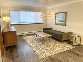Saint Paul apartment for rent - Spacious living room with large picture window.