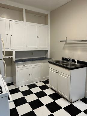 St. Paul apartment for rent - A kitchen with black and white checkered floor.