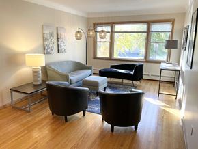 Saint Paul apartment for rent - Spacious, well -lit living room with large, west-facing picture window.