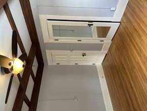 St. Paul apartment for rent - A ceiling fan with a light fixture hangs over a white ceiling.