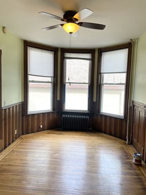 St. Paul apartment for rent - Large main room of a grand scale - with bowed windows and 11' ceilings.