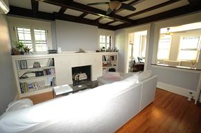 St. Paul apartment for rent - A living room with a fireplace and a white couch.