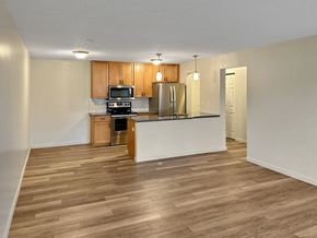 New Hope apartment for rent - A kitchen with wooden floors and white walls.