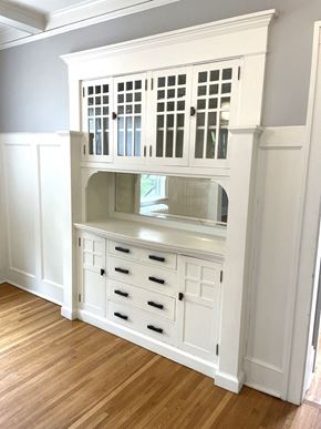 St. Paul apartment for rent - A white cabinet with drawers and a shelf is in a room.