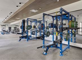 Newark apartment for rent - Luxury Fitness Center At 55 Union Newark NJ Featuring State-Of-The-Art Gym Equipment, Weightlifting Racks, Cardio Machines, Modern Workout Space