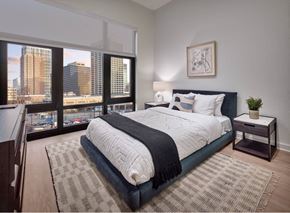 Newark apartment for rent - Luxury Bedroom At 55 Union Newark NJ Featuring Floor-To-Ceiling Windows, Skyline Views, Modern Finishes, Spacious Layout In A High-End Apartment Home
