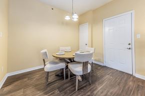 Long Beach apartment for rent - A dining room with a table and chairs.