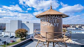 Evansville apartment for rent - A large sign for the National Biscuit Company stands in front of a building.