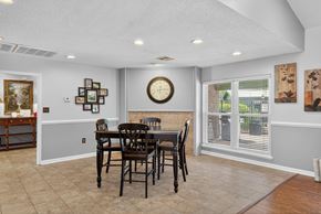 North Charleston apartment for rent - A dining room with a table set for four at North Bluff Apartments, South Carolina, 29406