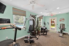 Summerville apartment for rent - A gym with a treadmill, elliptical machines, and other exercise equipment at Sawbranch Apartments, Summerville 29485