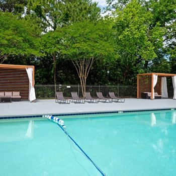 A pool with a blue rope in the middle of it