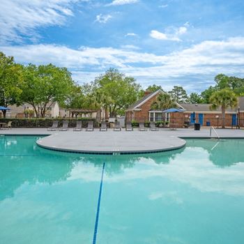 A swimming pool with a blue rope in the middle of it