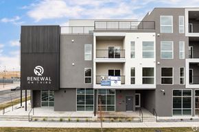 Logan apartment for rent - A modern building with the words Renewal on the side.