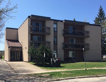 Sault Ste. Marie apartment for rent - Apartment building with a brown awning and a sign that says "555" on the front.