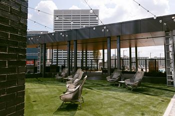 Patio with row of lawn chairs