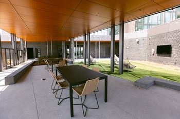 Long table with chairs in outdoor patio