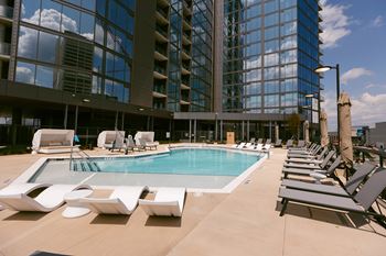 Pool area with sun loungers 